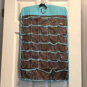 Hanging make up/jewelry holder